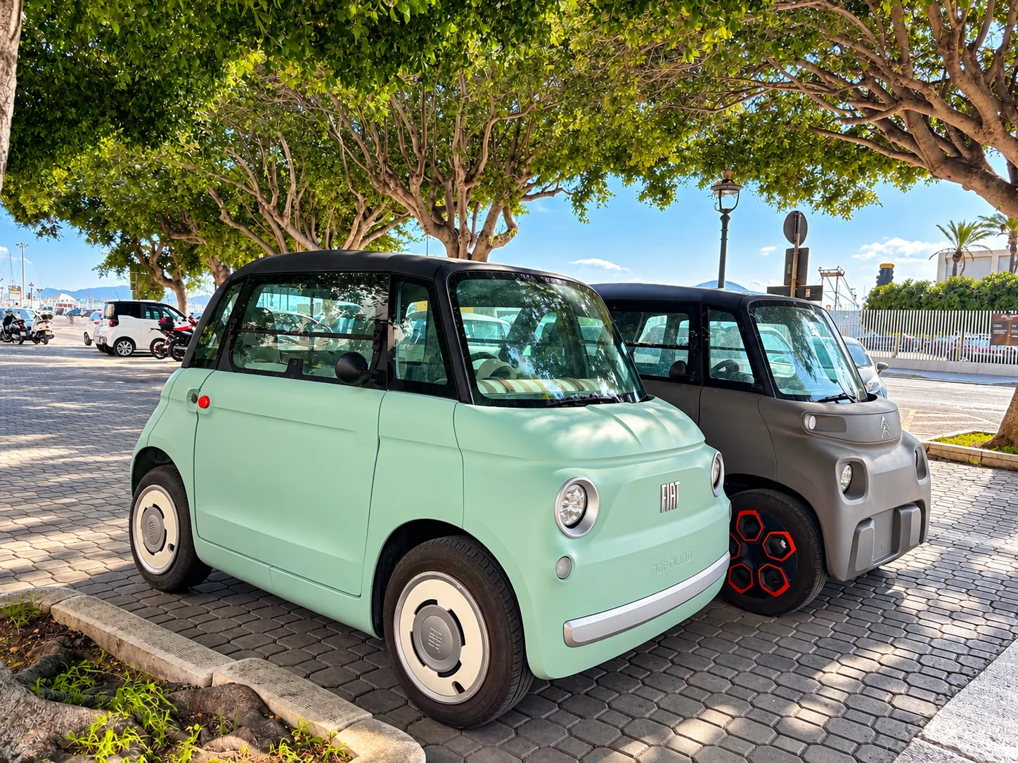 Two parked cars on a street