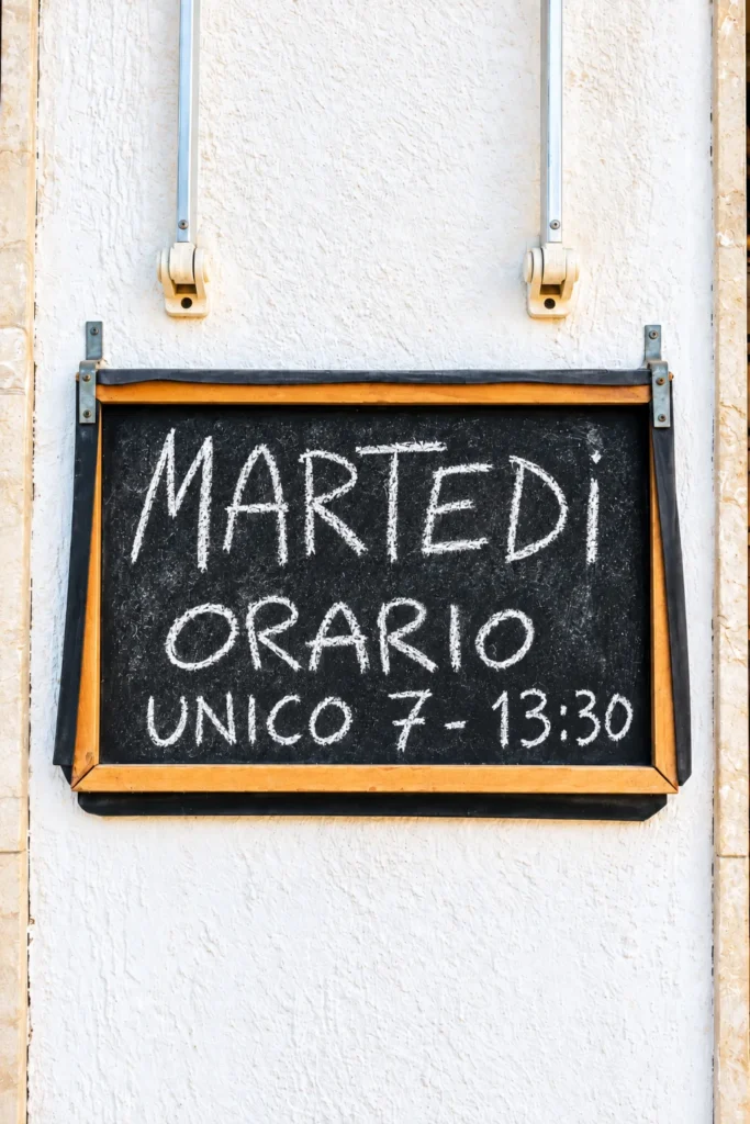 Opening hours displayed at the entrance